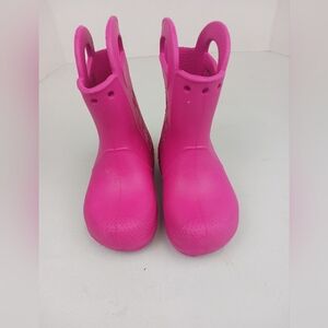 CROCS girl's pink pull on rain boots .  Children's size 8
